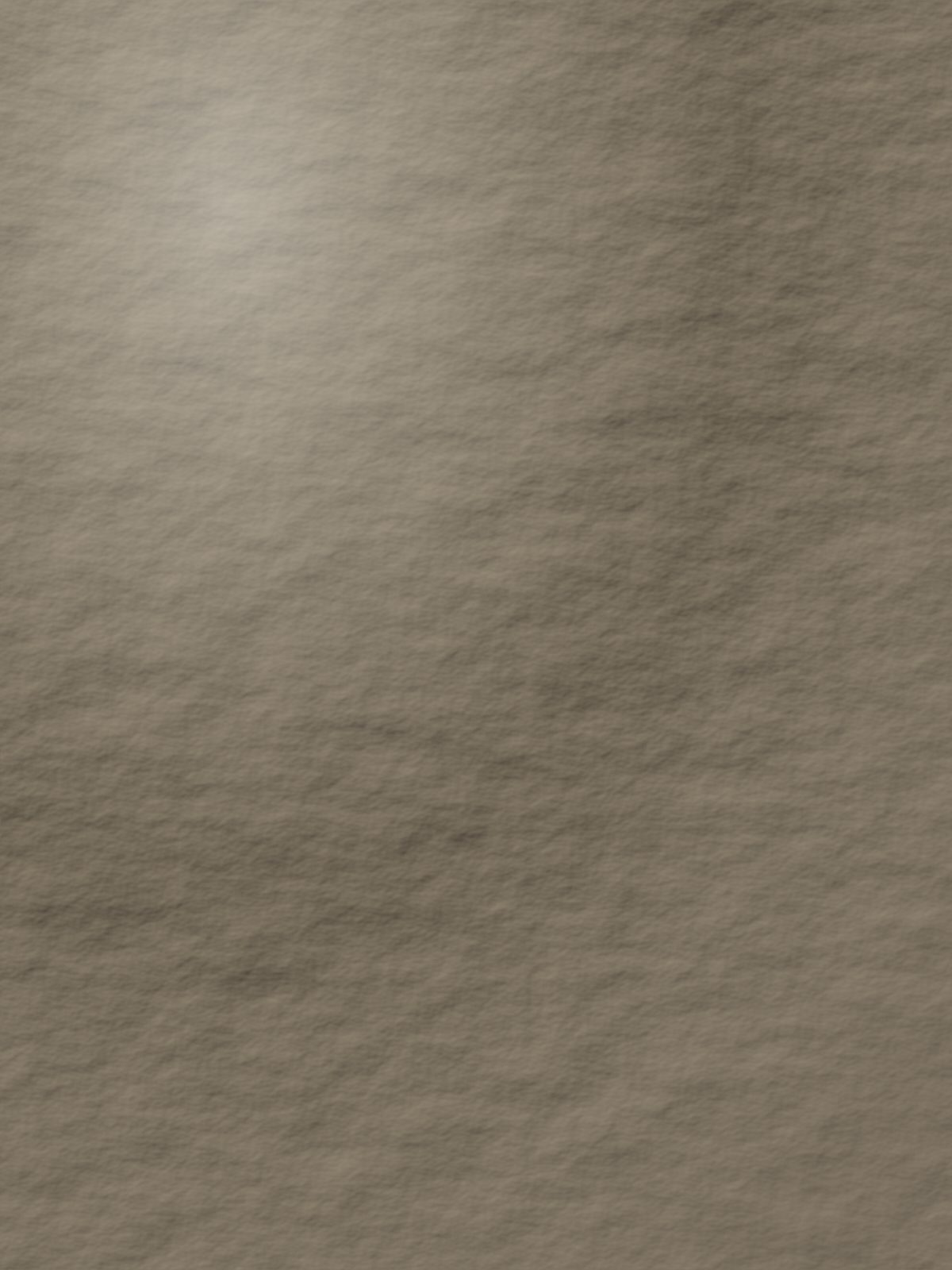 Fragment de matière — grain d'argile sous lumière rasante
